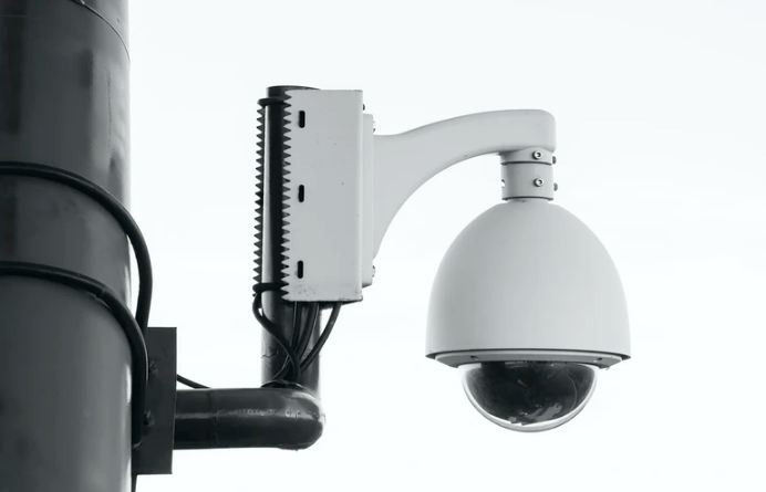 A-photo-of-a-security-camera-attached-to-the-post