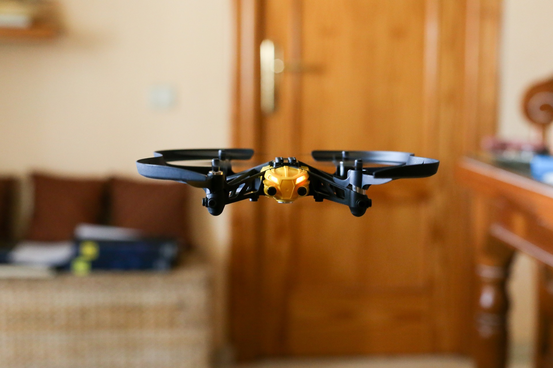 a small drone flying inside the house