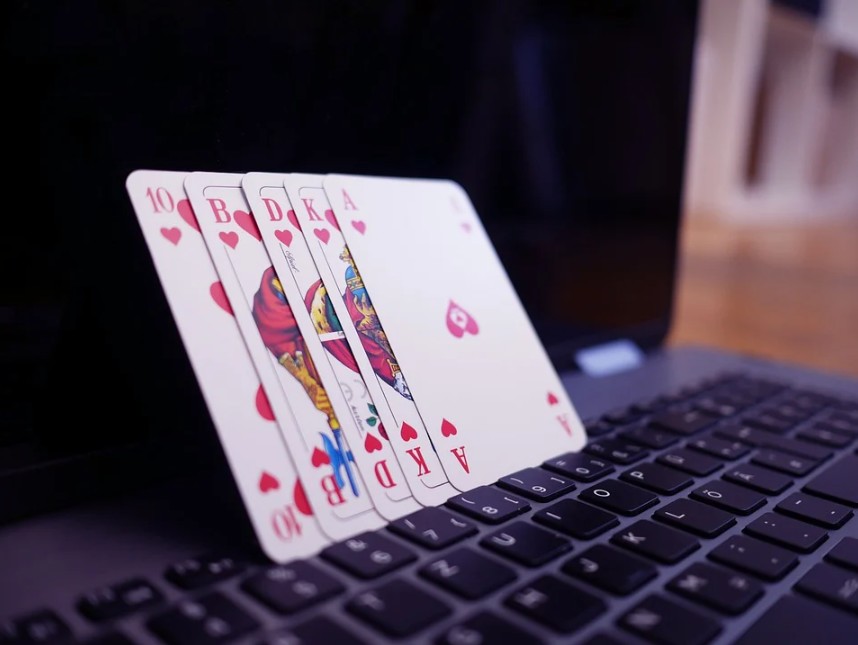 card on top of a laptop