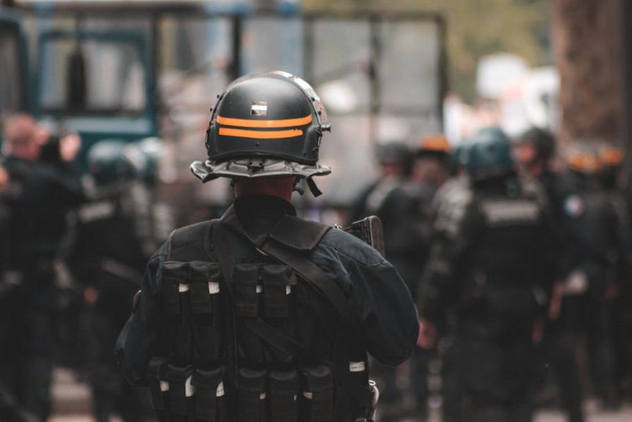 a police officer wearing a bullet-proof vest