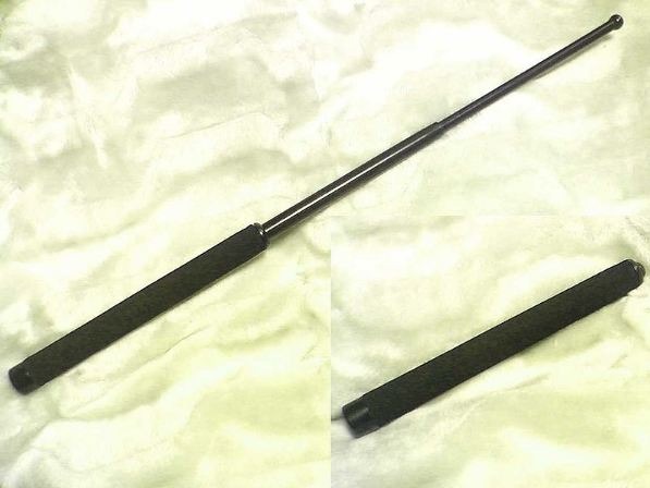 a black, telescopic self-defense wand